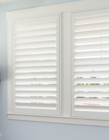 White plantation shutters with hidden tilt rods in Tampa